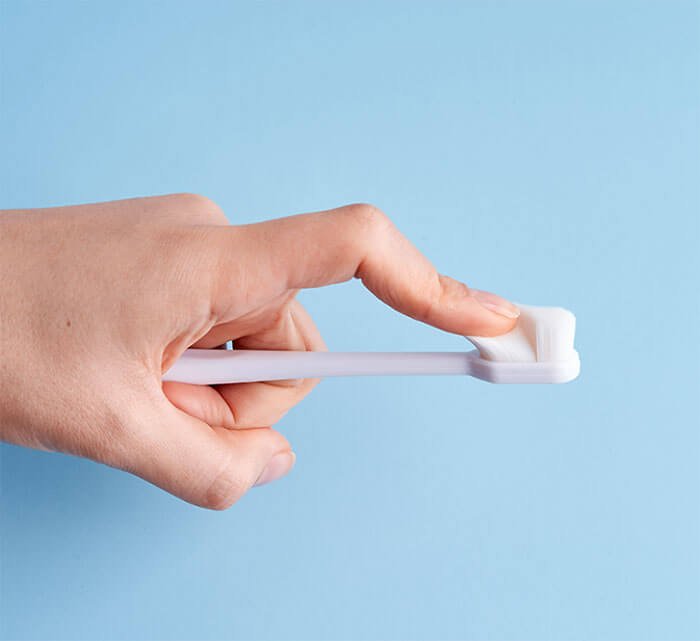 Switch to a soft-bristled toothbrush for sensitive teeth